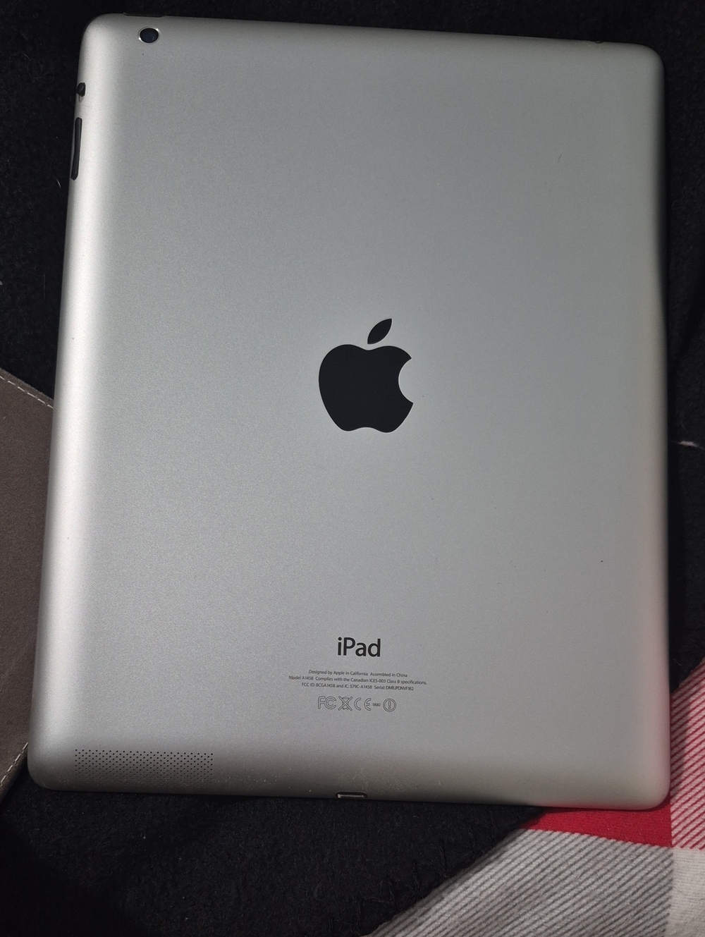 Apple iPad Silver Back with Black Logo 8". Very Good Condition.
